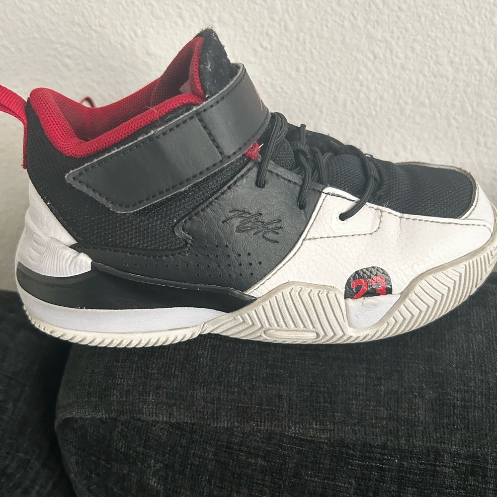 Jordan Kids Black and White Sneakers with Red Accents